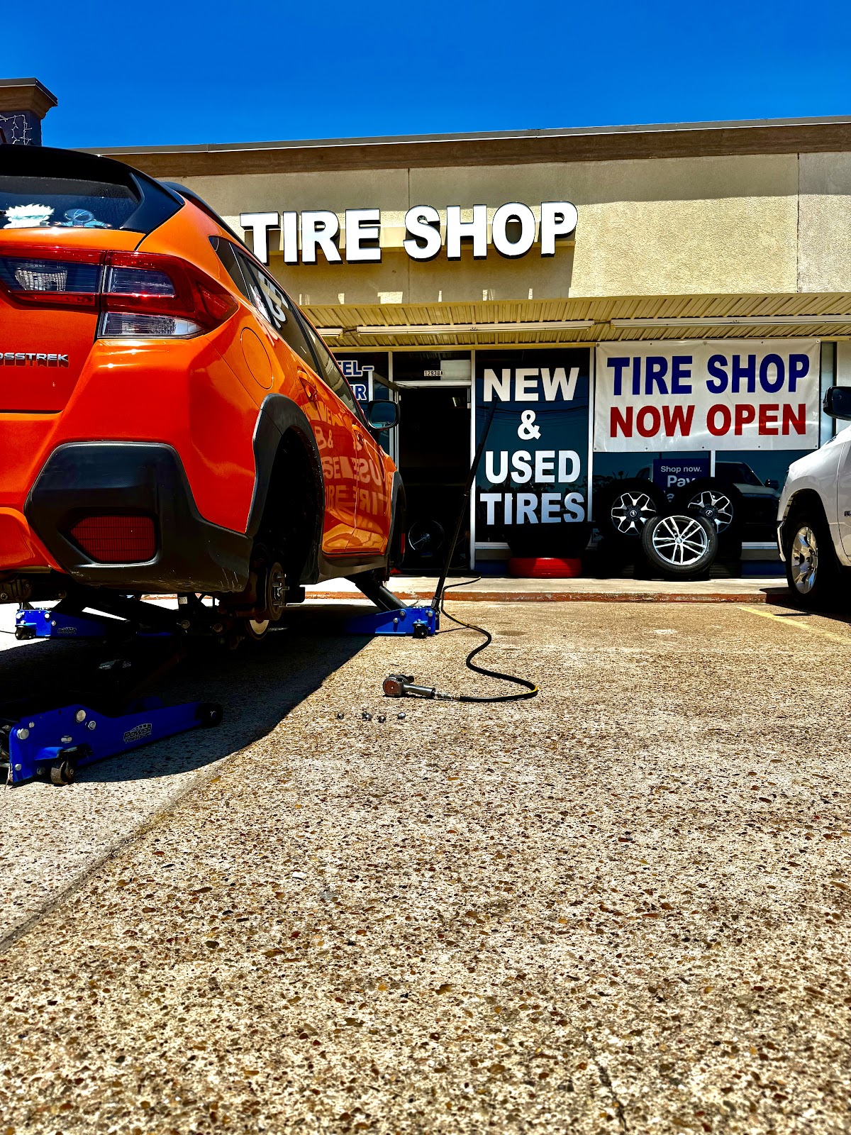 Tire service area at PALMA New and Used Tire Shop